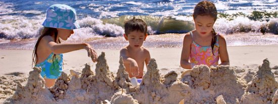 Children playing at the beach